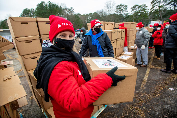 Delta employees volunteer at the recent Hosea Helps event.