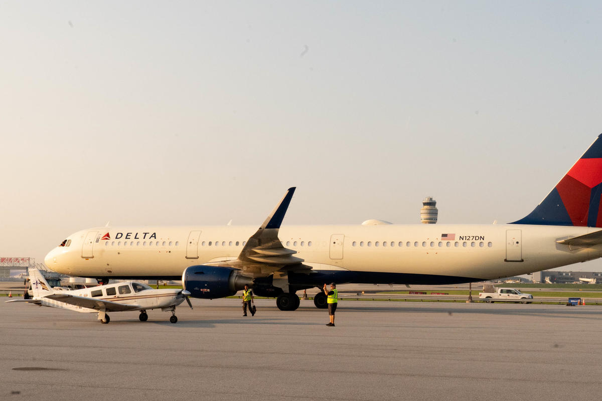 Pilots Barry Behnfeldt and Aaron Wilson, along with maintenance technician Thomas Twiddy make a stop at Hartsfield-Jackson Atlanta International Airport (ATL) during their 48N48 mission -- an attempt to land in all 48 of the contiguous states within 48 hours. They were greeted by Delta Chief of Operations John Laughter.